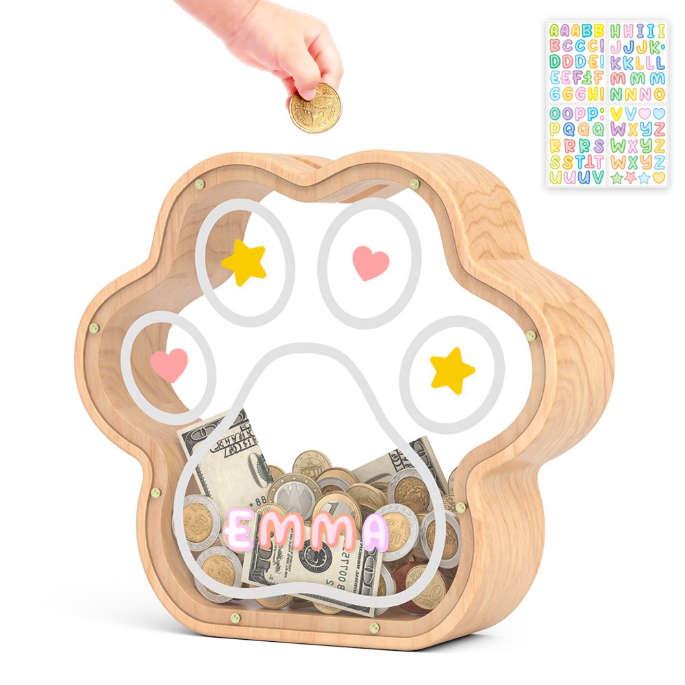 Natural wood personalized paw piggy bank with the name Emma, showing coins saved inside the clear front.