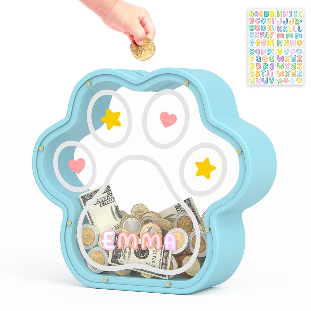 Blue animal paw savings bank being filled with coins, a great personalized birthday gift idea for boys.