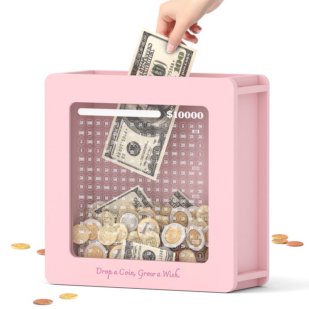 Dropping folded cash into the top slot of the pink cash tracker piggy bank, a stylish way for teen girls and women to save money.