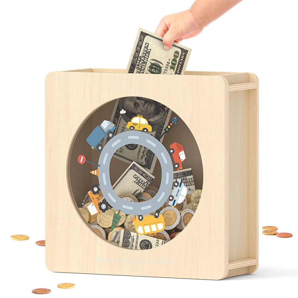 Inserting a folded dollar bill into the wide top slot of the natural wood boys piggy bank, watching savings grow through the clear front window.