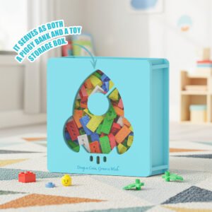 The versatile blue rocket piggy bank being used as a fun toy storage box, filled with colorful building blocks visible through the clear window.